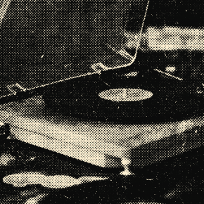 A blue record player with a vinyl record spinning, surrounded by records and album covers.
