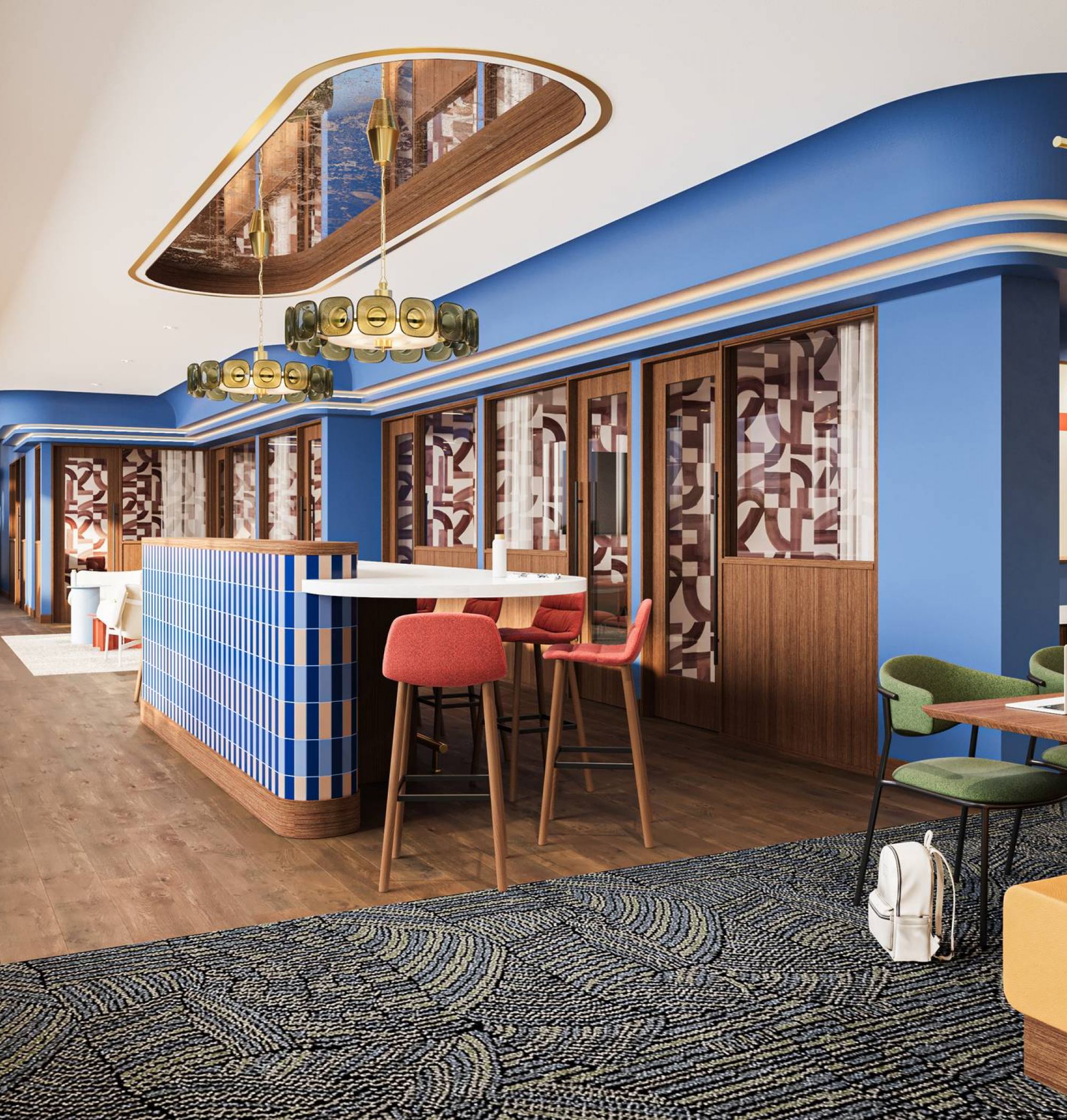 LOCAL On Delmar apartments Modern coworking space with colorful seating, blue accents, patterned carpet, and large windows for natural light.
